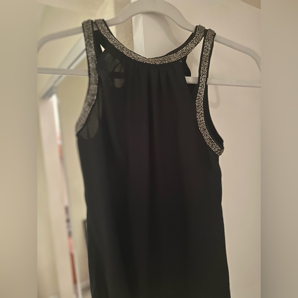 Brand new. Size S, express top